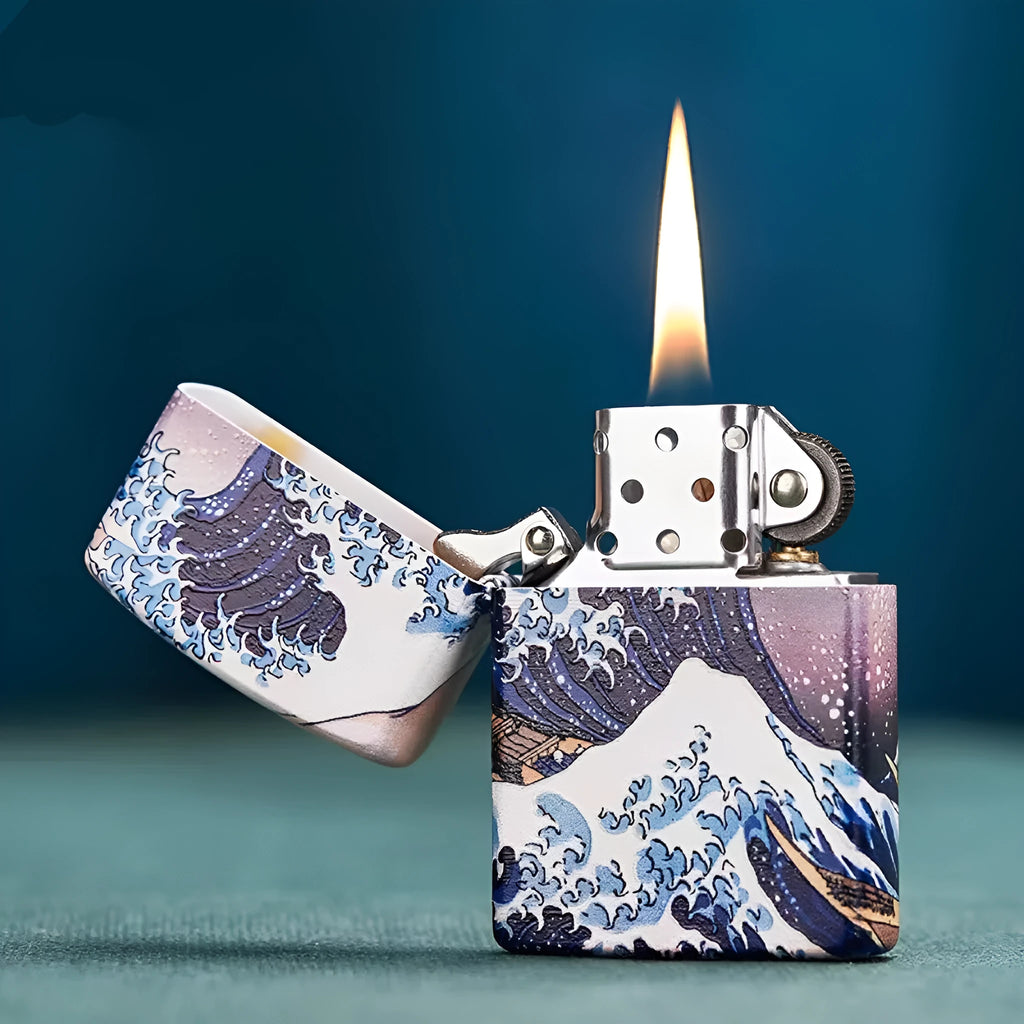 Coloured lacquer windproof lighter with Kanagawa surf design, steel inner liner, copper housing, 58 x 39 x 13mm.