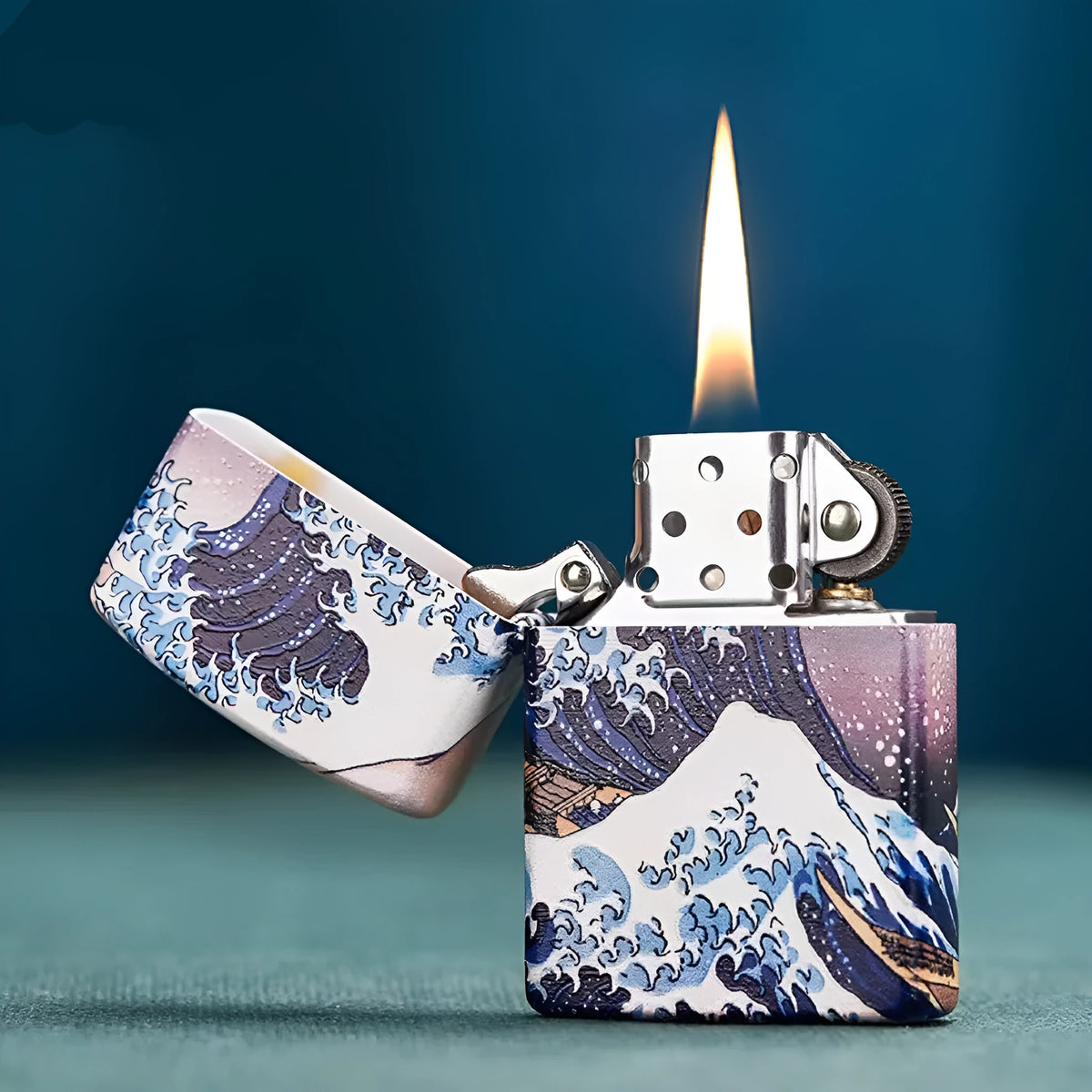 Coloured lacquer windproof lighter with Kanagawa surf design, steel inner liner, copper housing, 58 x 39 x 13mm.