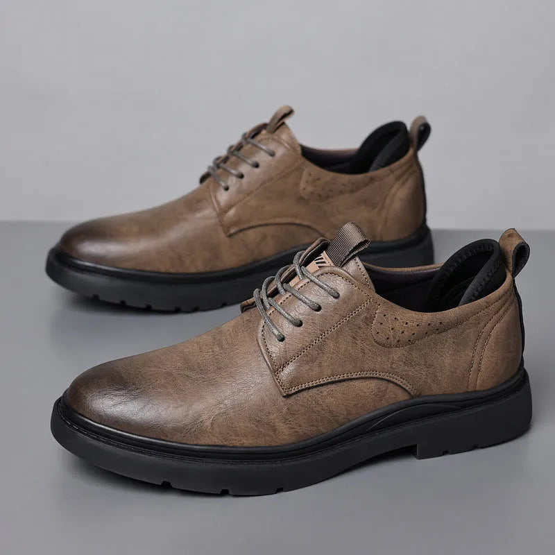 Men's black and brown leather casual sneakers with sewing line details on a two-layer cowhide upper.