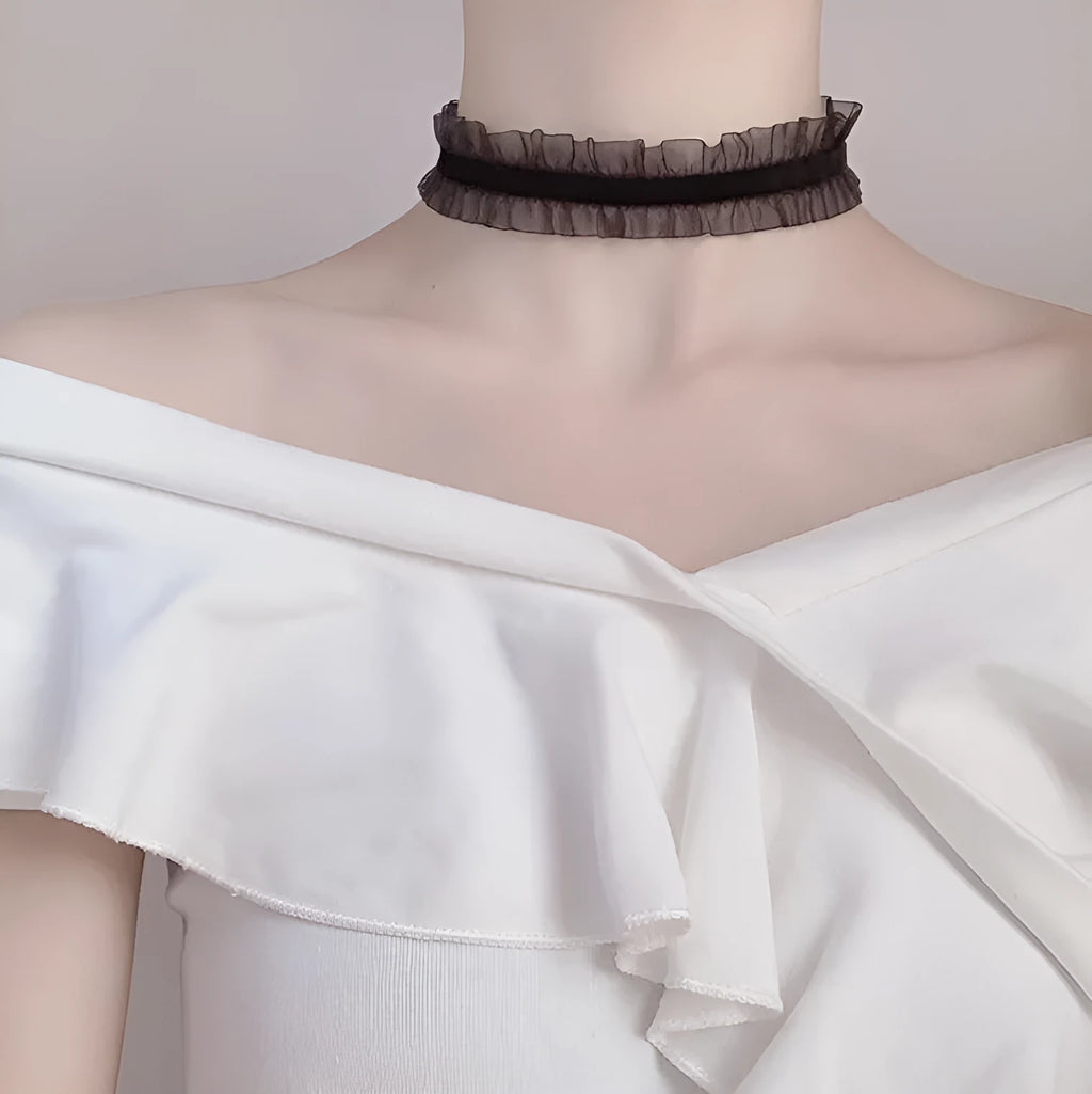 Electroplated alloy flower necklace with velvet ruffles on a 42 cm snake bones chain in light coffee colour.