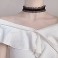 Electroplated alloy flower necklace with velvet ruffles on a 42 cm snake bones chain in light coffee colour.