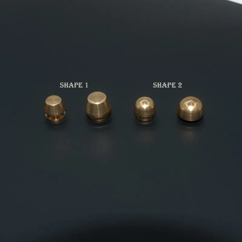 Brass decorative buckles showing 10mm and 12mm sizes with geometric and round foot nail designs