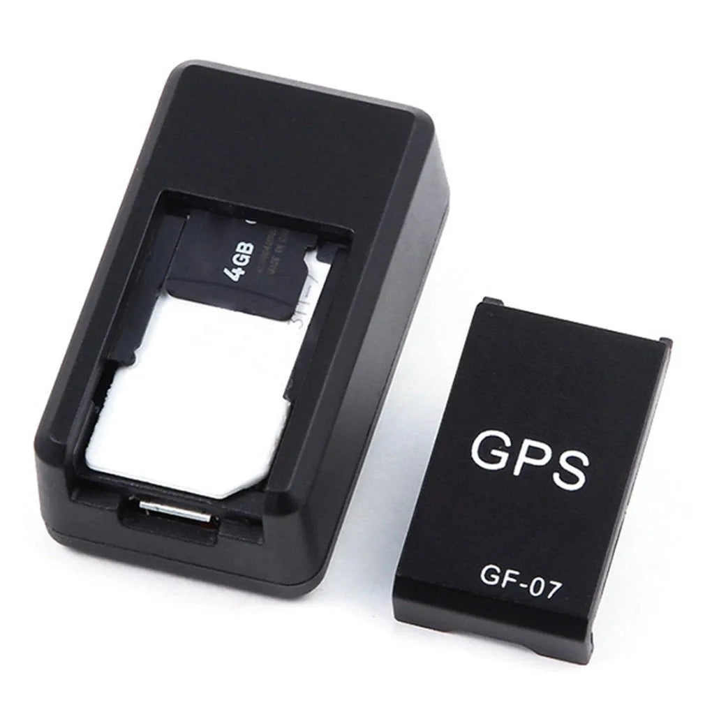 Black mini magnetic GPS car tracker device showing compact size and USB charging cable