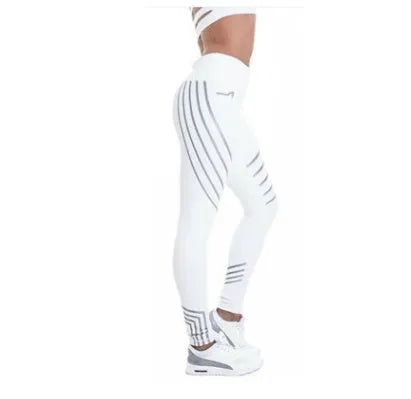 Women's black workout leggings with a glowing print, shown in a slim-fit pencil pants style.