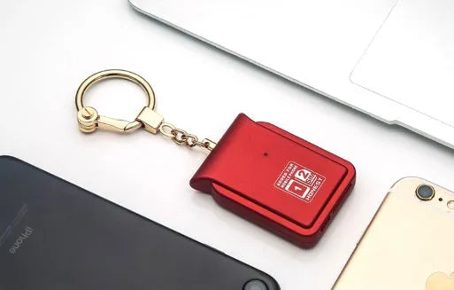 Bluetooth dual SIM adapter keychain for iOS devices in black leather colour with NANO SIM slots