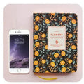 Green fabric imitation leather floral notepad with wireless binding and custom logo print area.