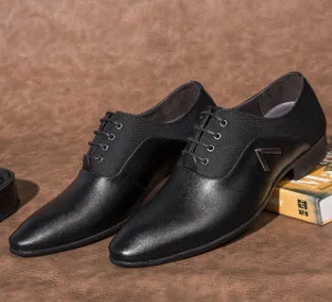 Men's black Oxford shoes with a low-top PU upper and rubber sole on a white background.