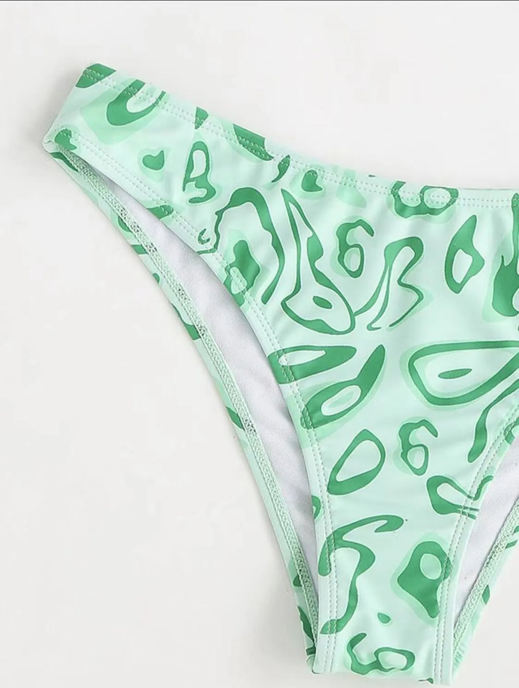 Women's green floral bandeau split swimsuit with triangle top and matching briefs