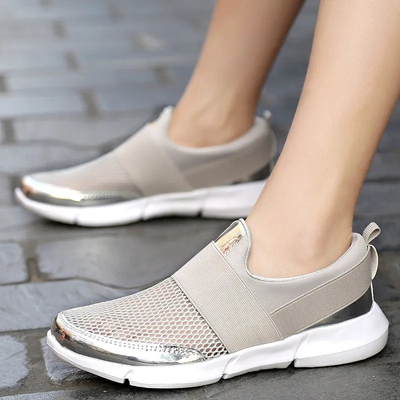 Women's blue lightweight mesh sneakers with low-top design and colour-matching pattern