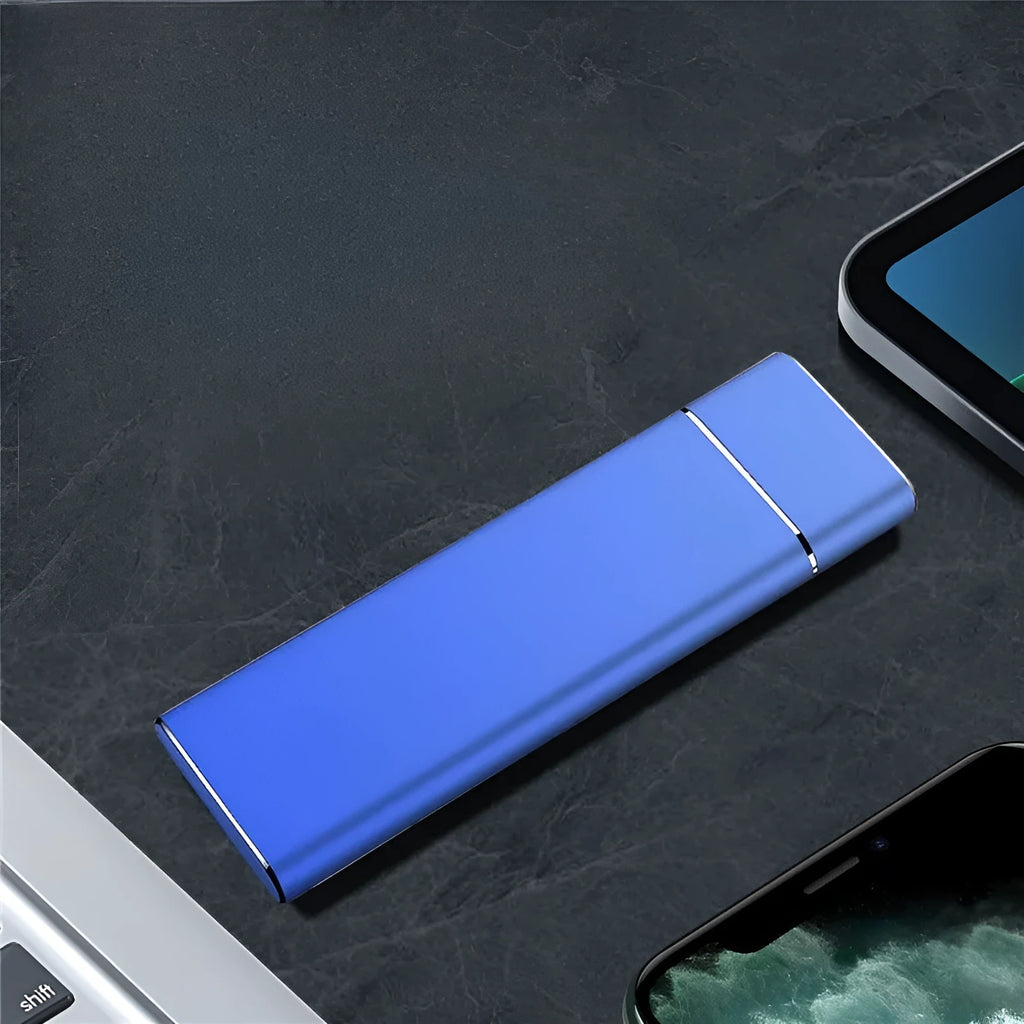 Sapphire blue portable external hard drive with metal shell showing USB connection cable