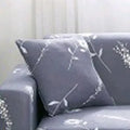 Geometric pattern stretch sofa slipcover on double seat sofa with matching cushion