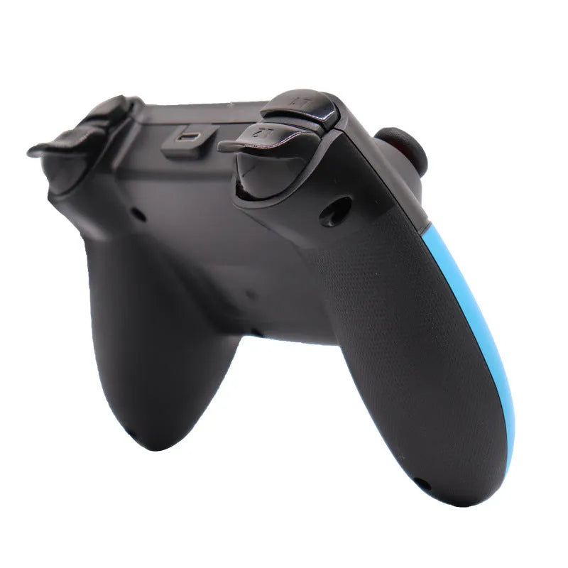 Switch Bluetooth wireless gamepad in left blue and right red colour scheme next to a Nintendo Switch console.