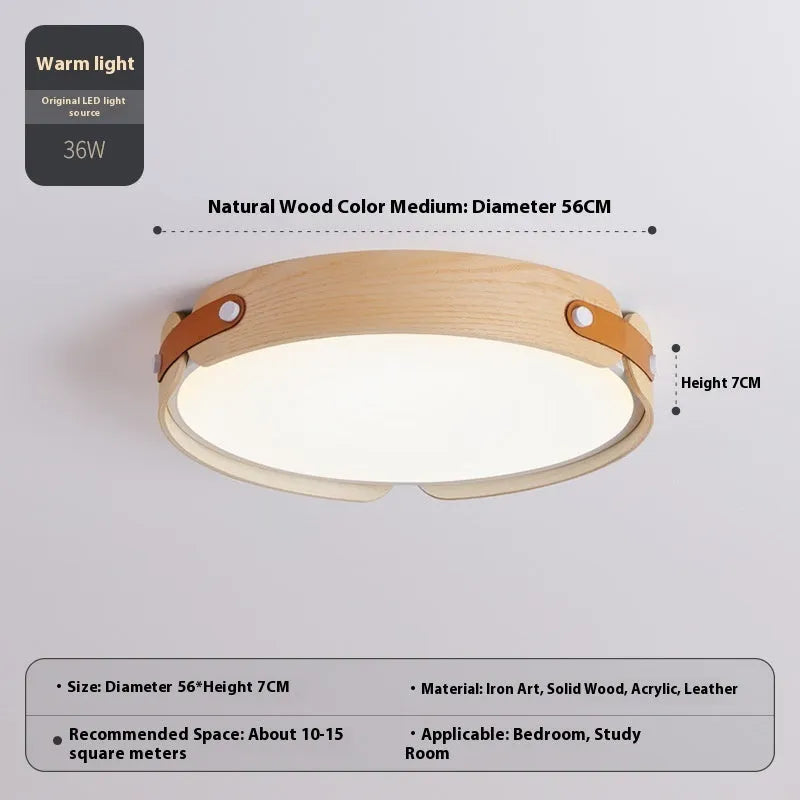Japanese style wooden ceiling lamp with a PMMA shade in a warm light colour, shown in a bedroom setting.