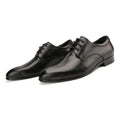 Men's black handmade cow leather derby shoes with pointed toe and checkered sewing pattern on a rubber sole.