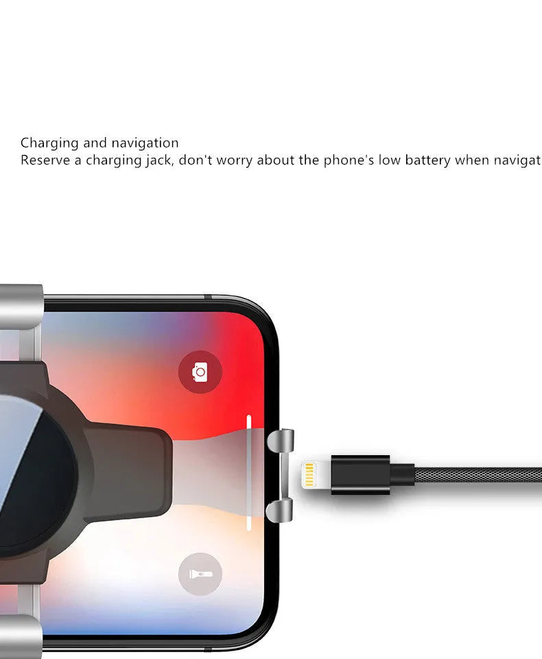 Black ABS gravity mirror phone bracket clipped onto a car air vent.