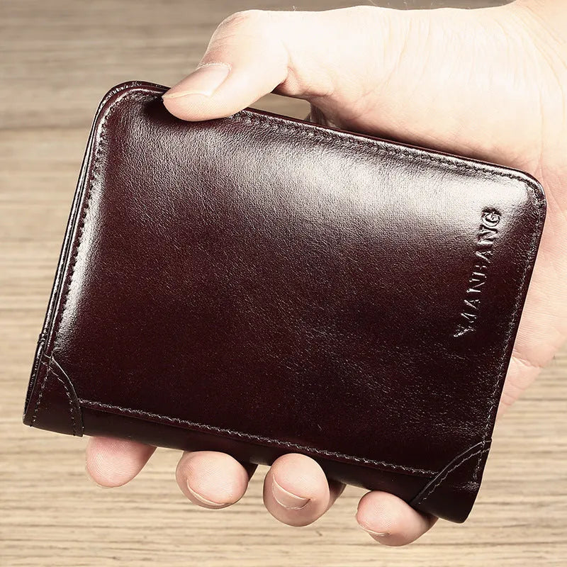 Men's brown leather wallet open to show card slots, ID window, coin pocket, and banknote fold.
