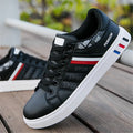 Men's sports shoes in black, also available in grey and white, showing EU size labels.
