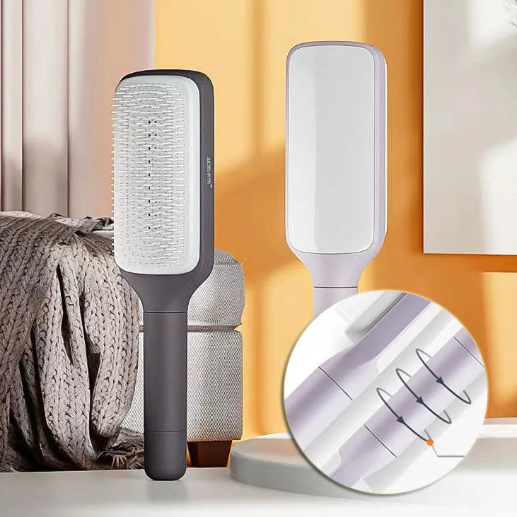 Self-cleaning hair brush in Roland purple colour showing rotate handle mechanism and bristle design