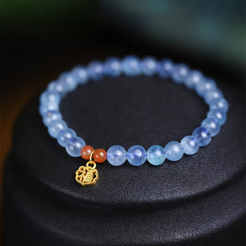 Ice translucent aquamarine crystal bracelet with 8mm round beads and sequin decoration