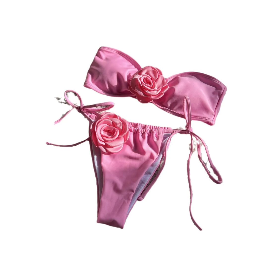 Women's rose tube top swimsuit with drawstring straps in light purple, shown with briefs-style bottom.