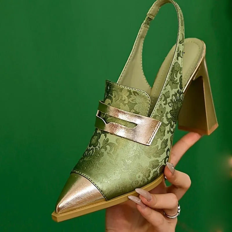 Women's black chunky heel pointed-toe sandals with a high-cut ankle strap.