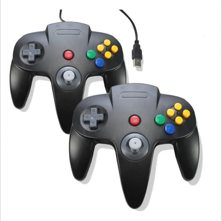 Blue USB N64 game controller for PC computer on a desk.