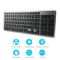 Ultra-thin white Bluetooth keyboard next to iPad tablet showing 104-key layout