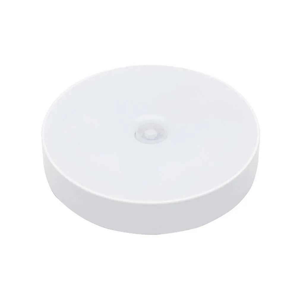 USB rechargeable motion sensor LED night light with adhesive mounting in beige or white