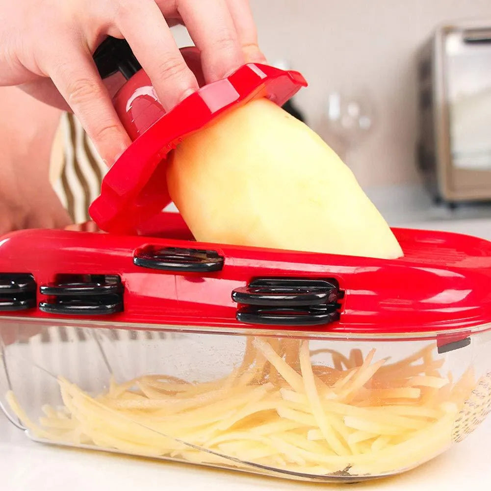 Red multi-function vegetable cutter set with seven stainless steel blades and safety hand guard