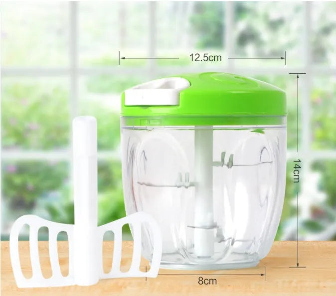 Manual kitchen chopper with stainless steel blades and green ABS plastic bowl