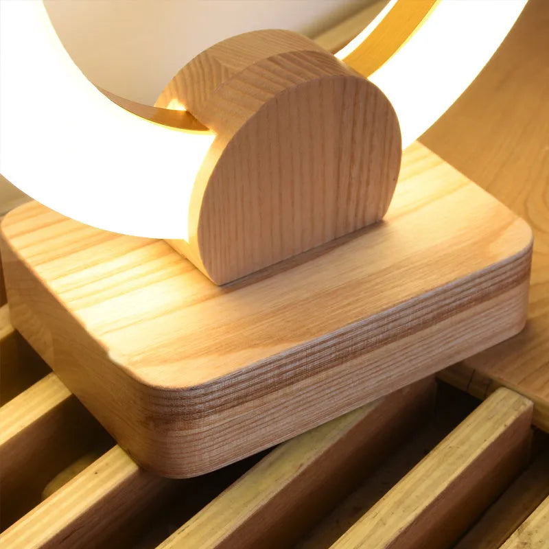 Nordic style circular wooden art chandelier with round acrylic shade, shown in two diameter sizes