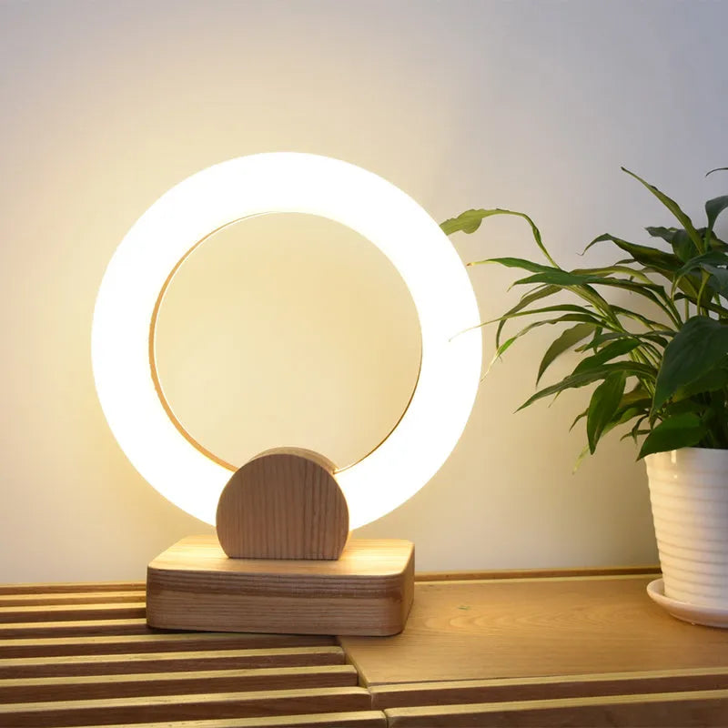 Nordic style circular wooden art chandelier with round acrylic shade, shown in two diameter sizes