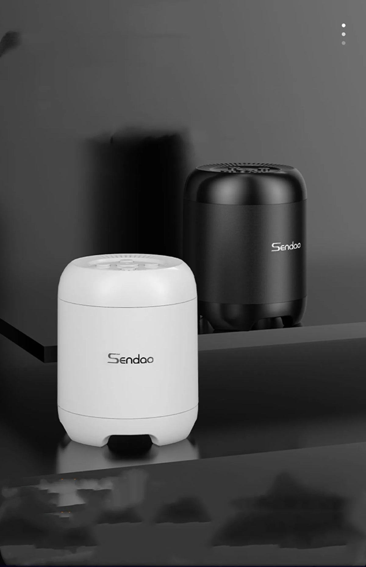 Compact black and white portable Bluetooth speaker with super subwoofer measuring 90x73x73mm