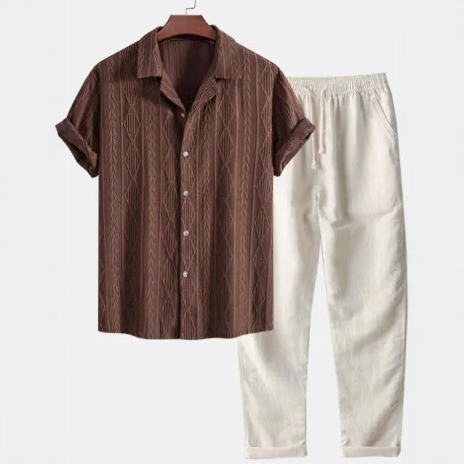 Men's slim fit linen casual suit with camouflage printed short sleeve shirt and trousers.
