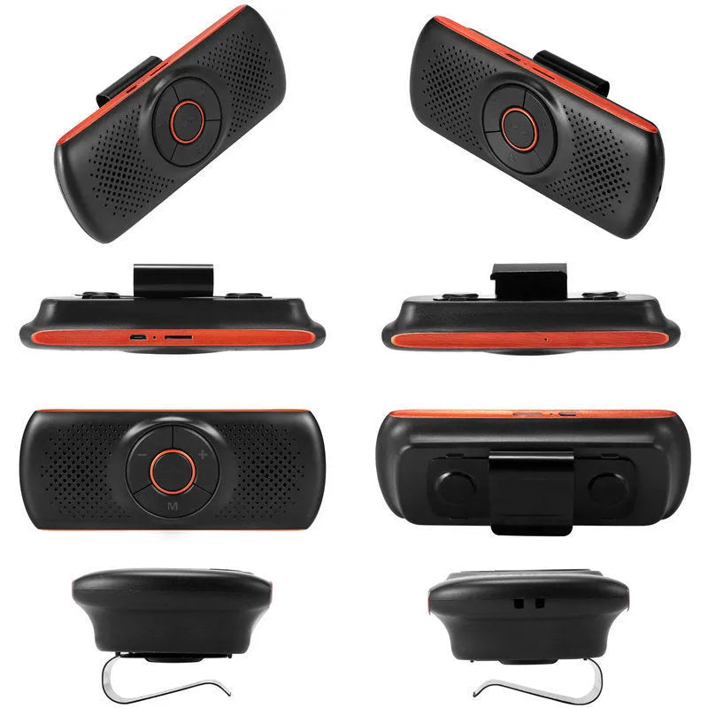 Orange plastic Bluetooth hands-free car speaker mounted on a sun visor for wireless smartphone calls and music.
