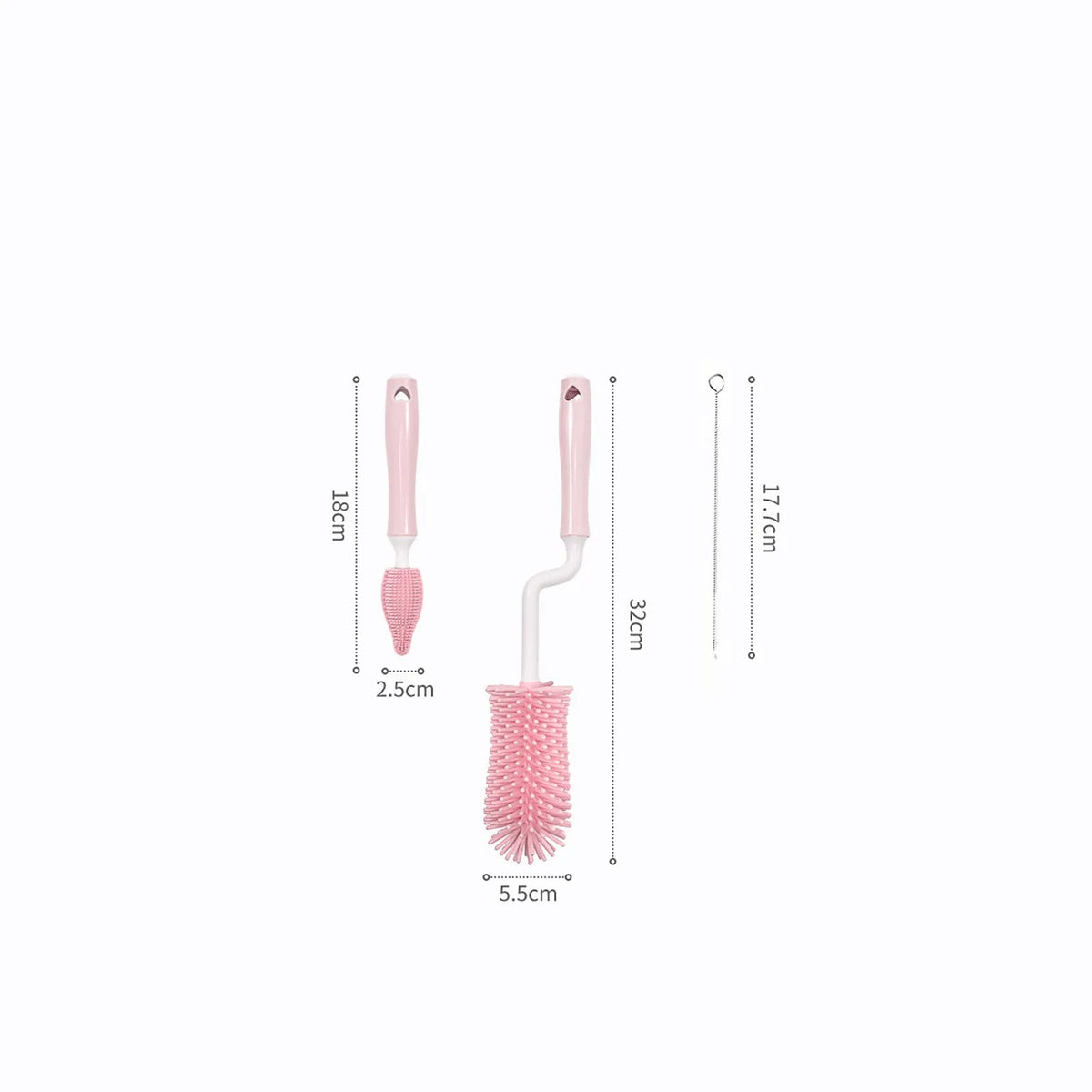 Three silicone baby bottle brushes on a counter, including a main brush and a narrow straw cleaning brush.