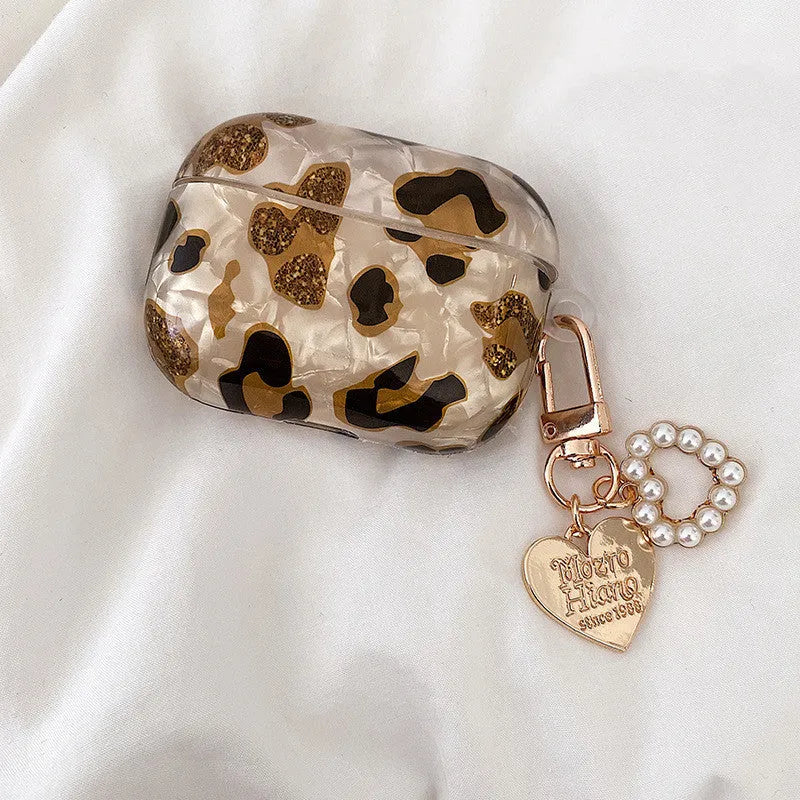 Yellow leopard print TPU flip case for Apple AirPods Pro headphones with optional pearl chain accessory