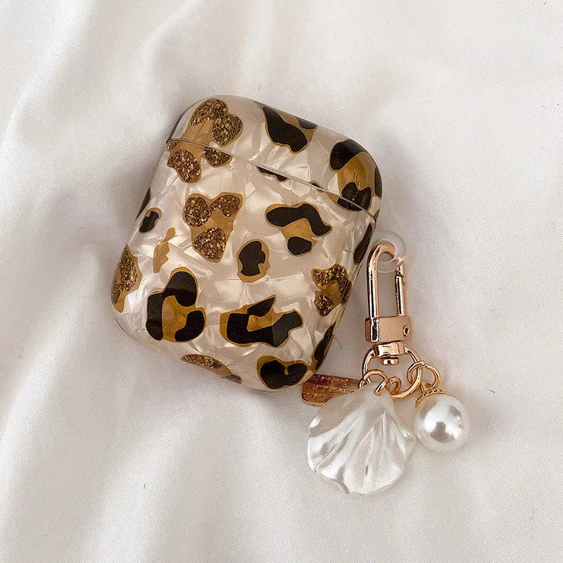 Yellow leopard print TPU flip case for Apple AirPods Pro headphones with optional pearl chain accessory