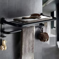 Modern aluminium folding bathroom shelf with two tiers, shown in a size with perforated panels and hooks.