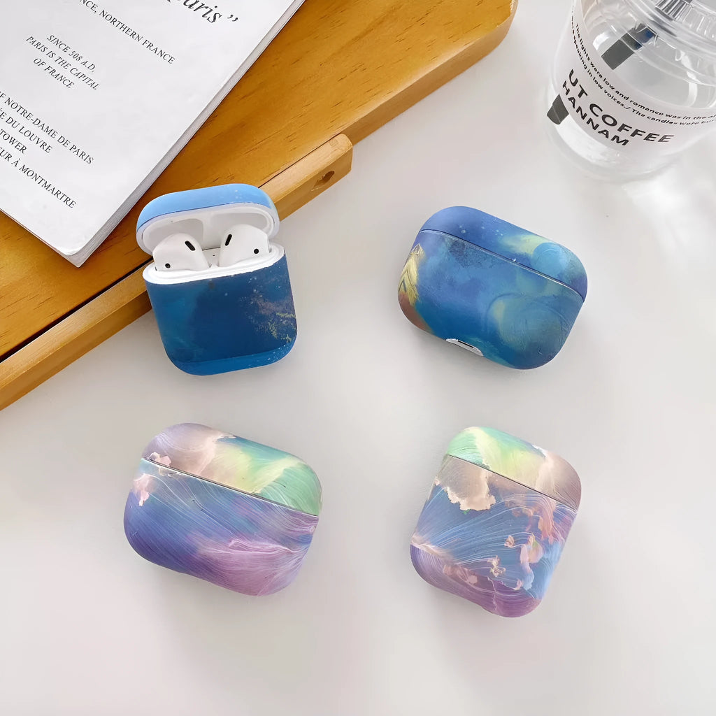 Blue and pink watercolour hard shell protective cases for Apple AirPods Pro and AirPods 1/2 charging cases.