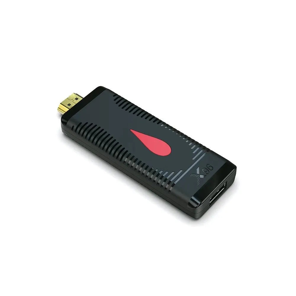 Smart network TV set-top box dongle with remote control, power supply, and HDMI cable on a white background.