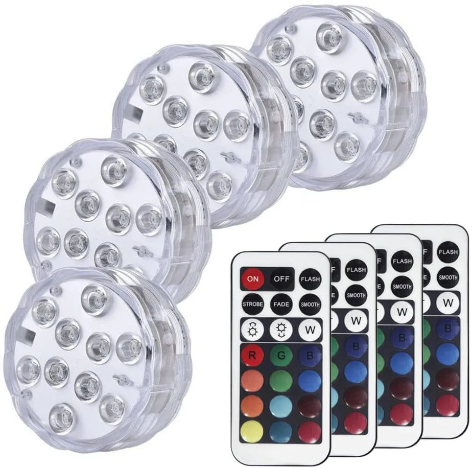 White IP68 waterproof LED diving light with remote control for pools and gardens.