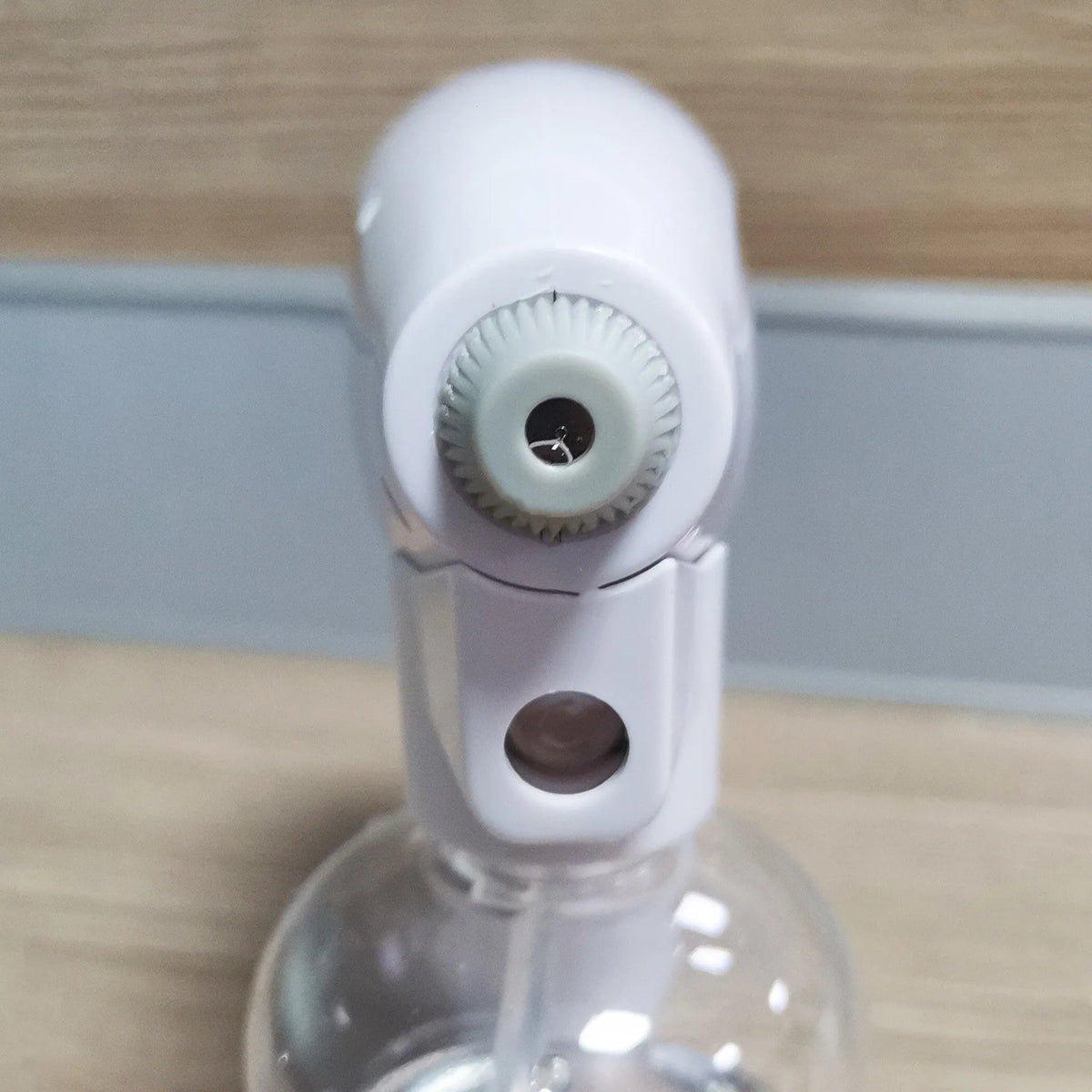 White handheld cordless electric spray gun with USB-C charging cable