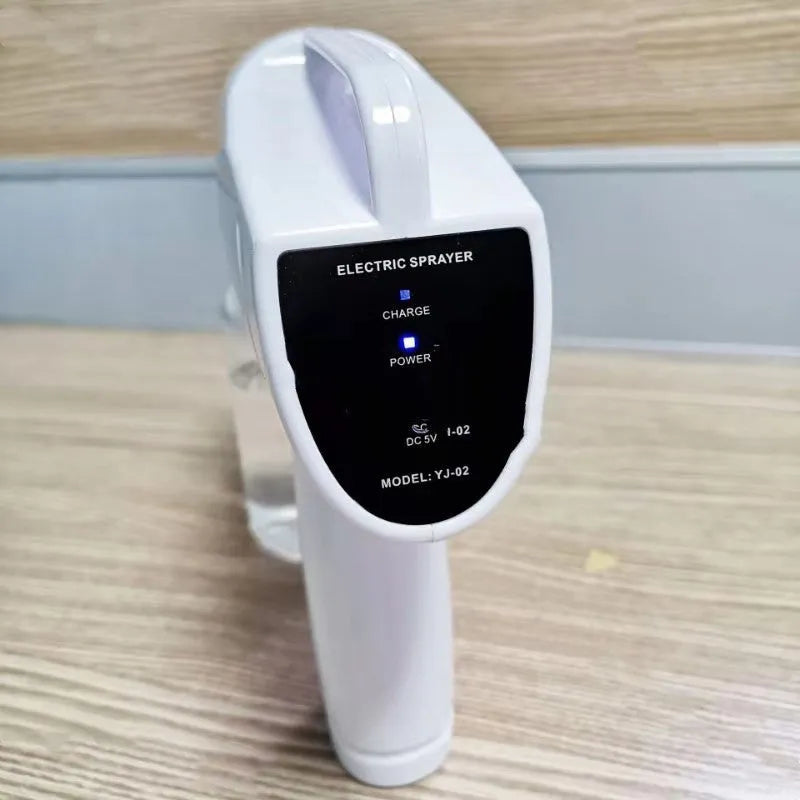White handheld cordless electric spray gun with USB-C charging cable