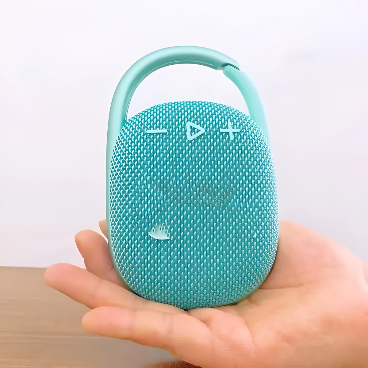 Small coloured 4th generation wireless Bluetooth speaker with USB port.
