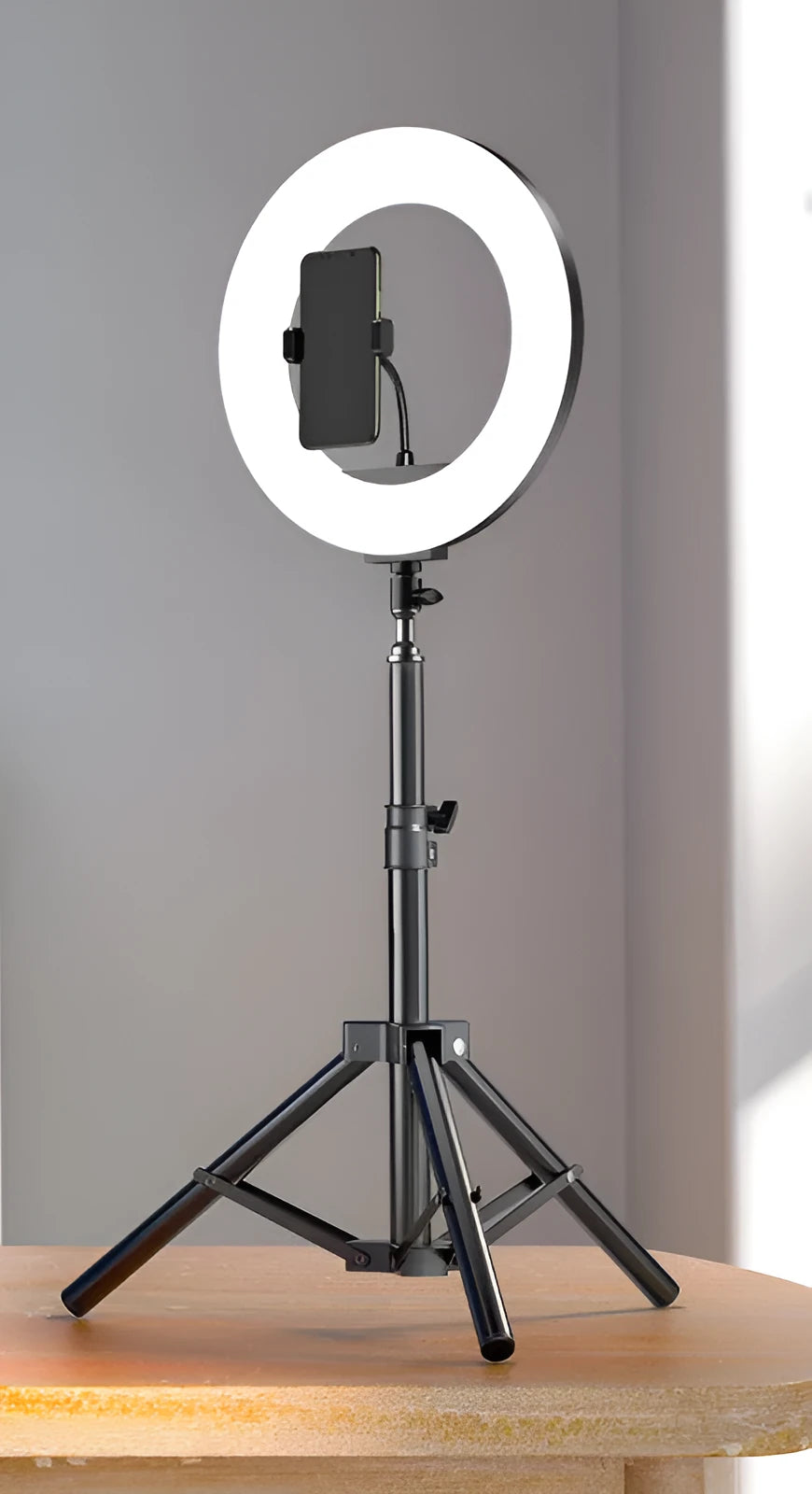 iPhone-compatible mobile phone live tripod with carbon steel bracket shown at different heights