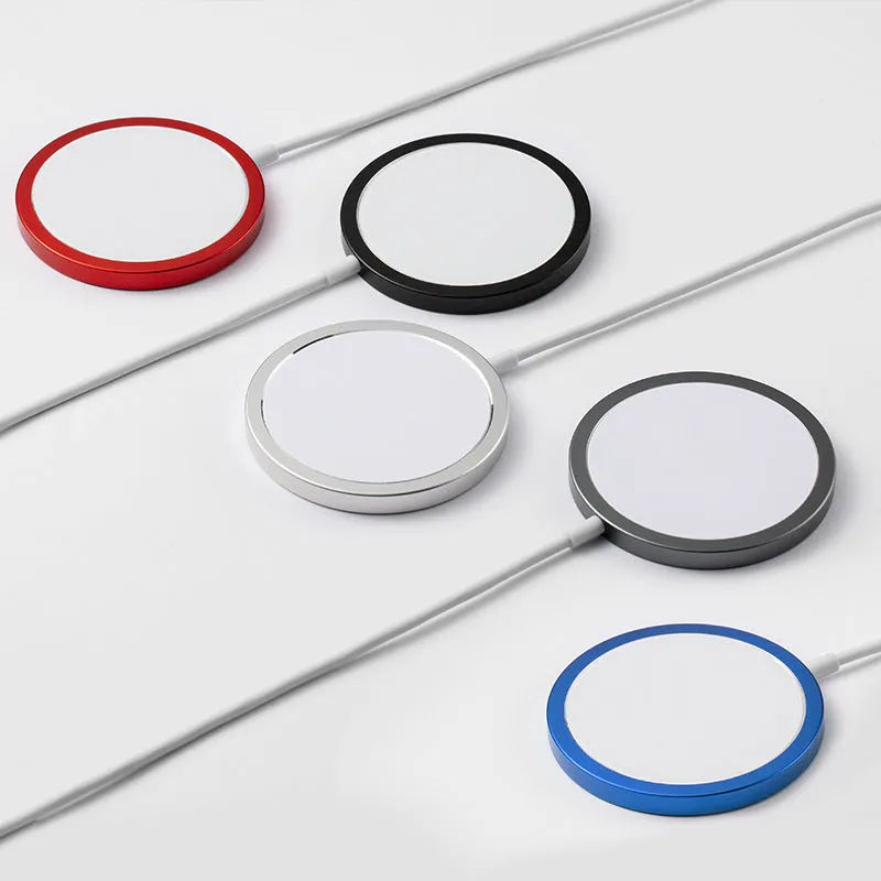 Silver metal Magsafe-compatible magnetic wireless charger for iPhone 12 and 13 series.