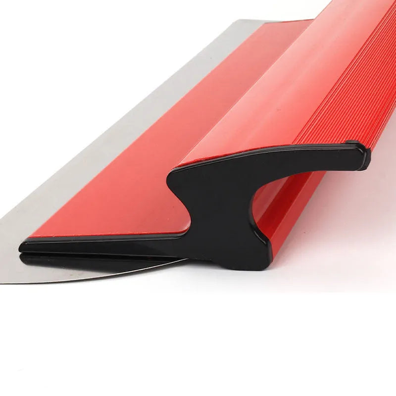 Red 40cm long levelling scraper tool for wall putty and wallpaper paste application.