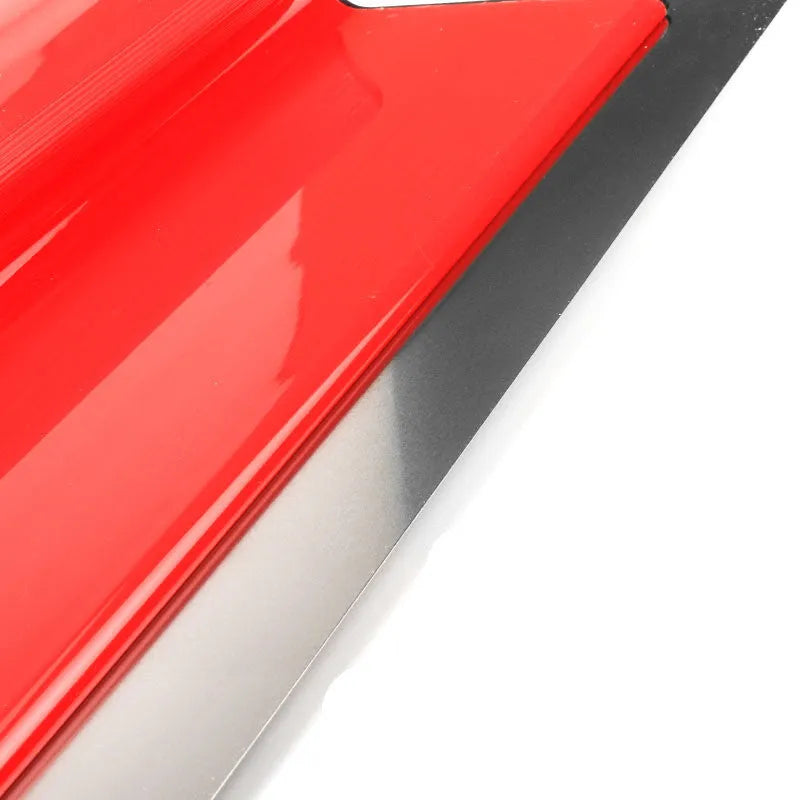 Red 40cm long levelling scraper tool for wall putty and wallpaper paste application.