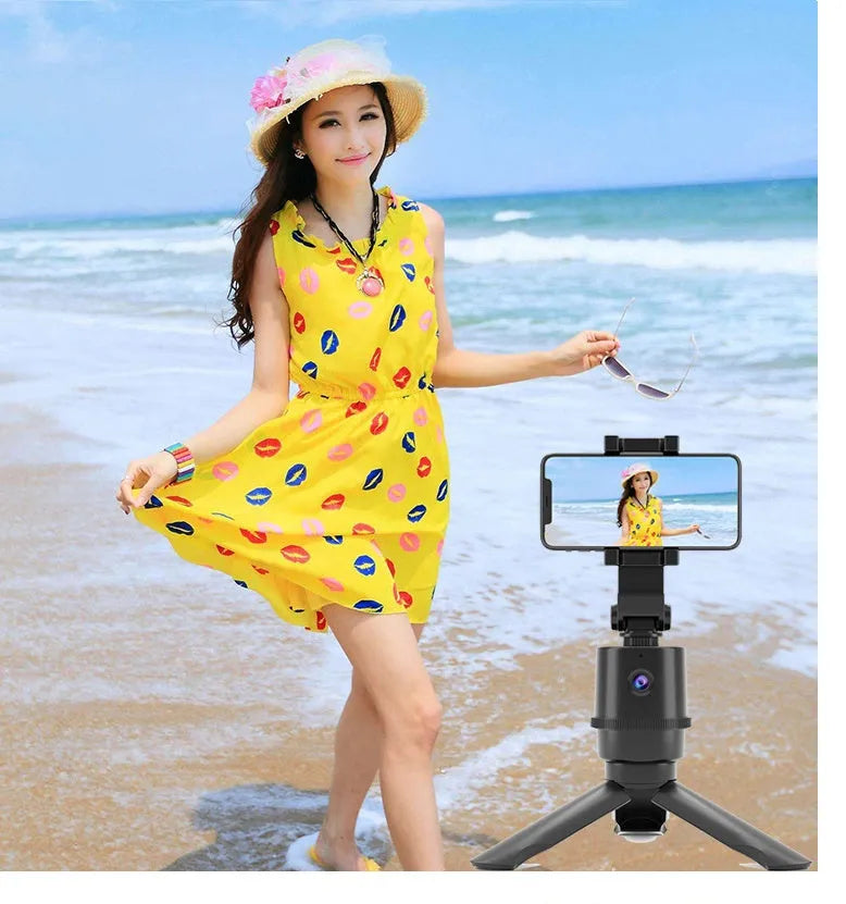 360-degree intelligent AI tracking pan tilt phone camera mount bracket for a smartphone on a selfie pole.